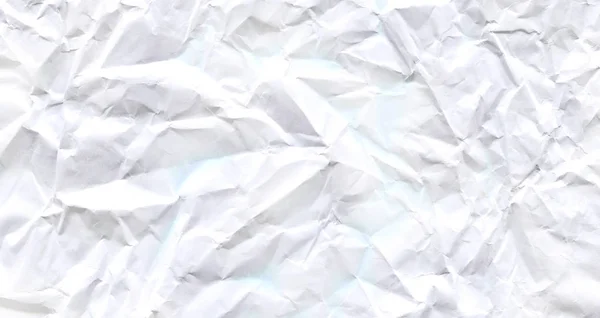 Wrinkled white  empty paper. Paper crumple texture. Space for text.