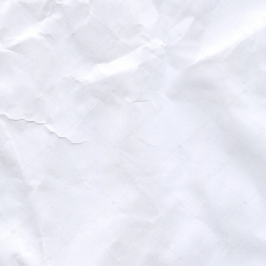 Wrinkled paper background. Close up crumpled white paper texture
