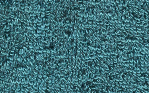 Textured fabric mint towel  background. Turquoise mint towel texture