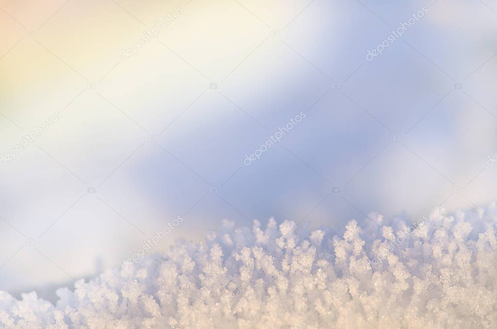 Snow texture background. Fresh snow texture. Sparkling snow with bokeh