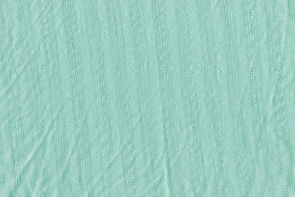 Turquoise fabric background texture.  Turquoise background from a textile material