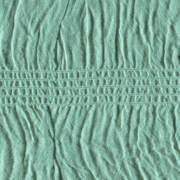 Turquoise fabric background texture.  Turquoise background from a textile material