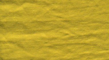 Arka plan için hardal kumaş dokusu. Hardal sarı kumaş. Kumaş doku arka plan