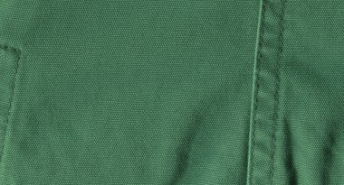 Yeşil keten doku arka plan. Arka plan için yeşil kumaş yüzeyi