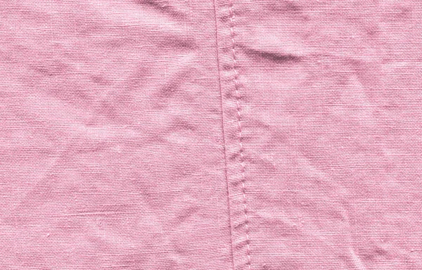 Surface pink texture. Cloth pink texture background. Pink linen background