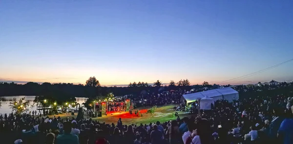 People listening to music and relaxing on ethnic Ukrainian festival.