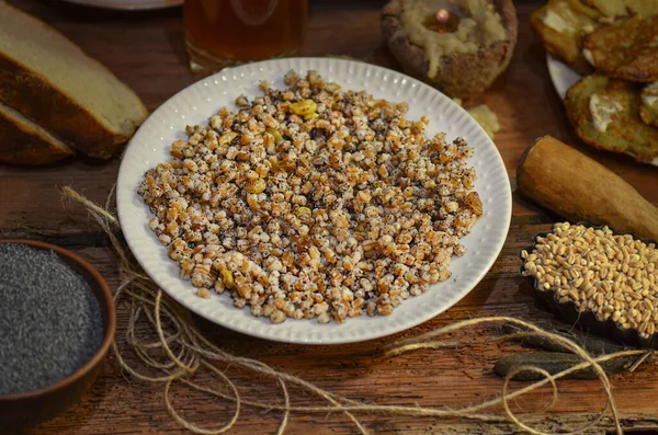 Crumbly pearl barley porridge.  Fresh homemade pearled barley. Pearl barley in bowl on a wooden table