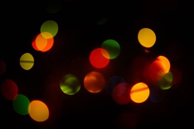 Bokeh arkaplanı kopyalama alanı ile bulanıklaştırılmış. Soyut dairesel bokeh arkaplanı