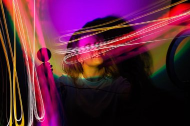 Blogger content creator using mobile phone gadget. Woman blogger influencer creating vlog video for social media.