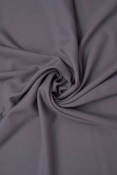 Tekstil ve doku konsepti. Buruşuk kumaş arkaplanının kapağı. Soyut arkaplan, boş şablon. Üst görünüm.