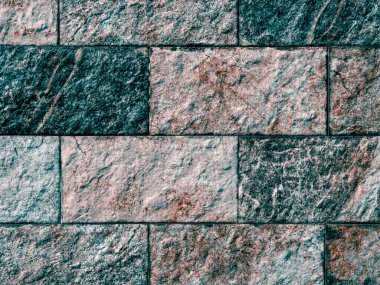 Yapay taş dokusu. Taş çit. Parktaki duvar..