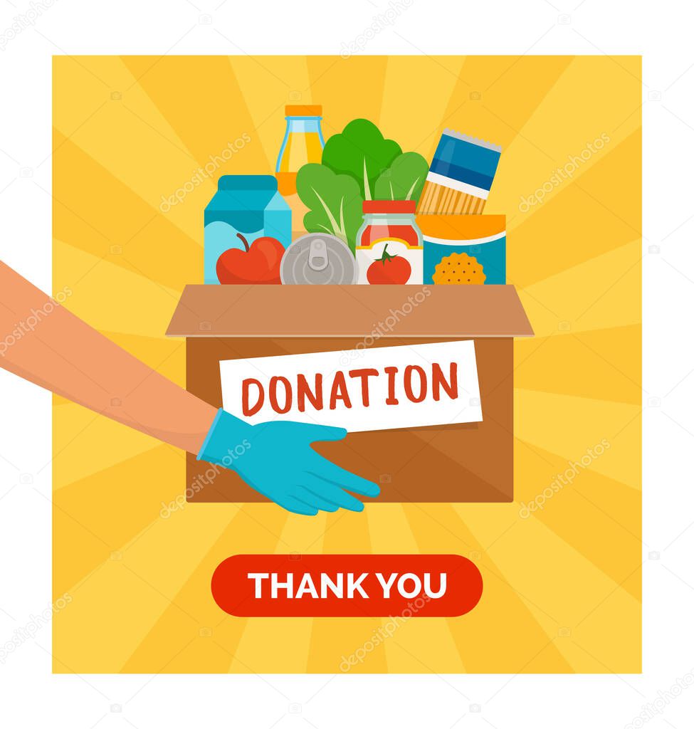Volunteer holding a donation box with grocery food, solidarity and volunteering concept