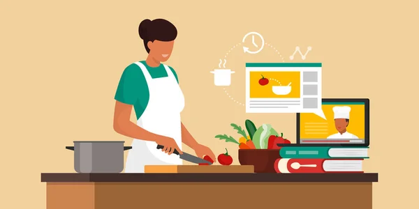 Mujer Aprendiendo Recetas Línea Ella Está Cortando Verduras Viendo Video — Vector de stock