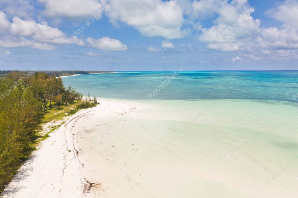 Large tropical island white sandy beach, view from above. Seascape, nature of the Philippine Islands.