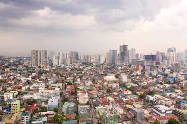 Panorama of Manila.The city of Manila, the capital of the Philippines. Modern metropolis in the morning, top view. Skyscrapers and business centers in a big city. clipart
