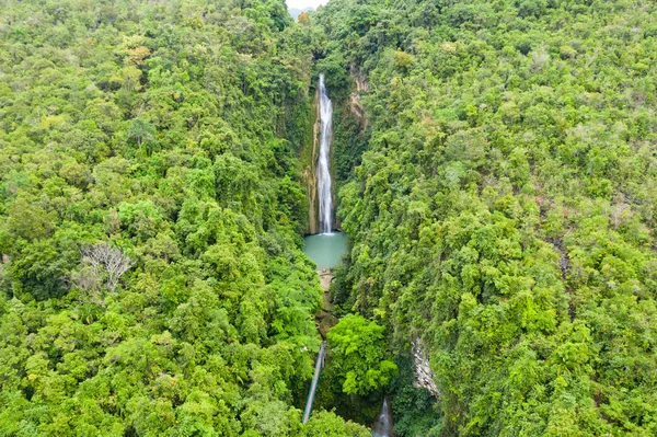 Waterfall in the jungle.Mantayupan Falls. Mantayupan Falls is one of the highest waterfalls in Cebu. The second level of the waterfalls has 98 meters high.