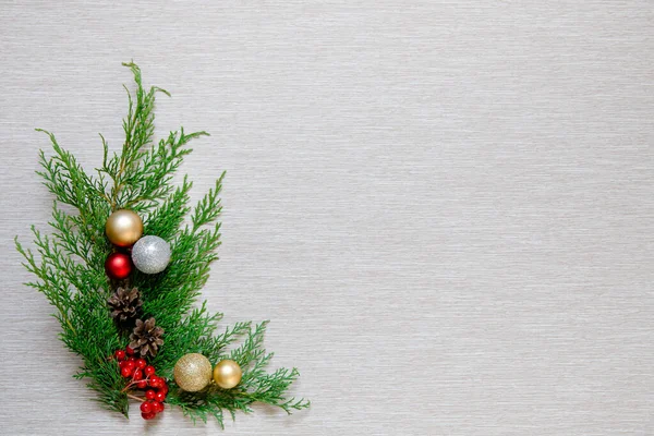 Christmas wooden background with fir branches and balls. — Stock Photo, Image