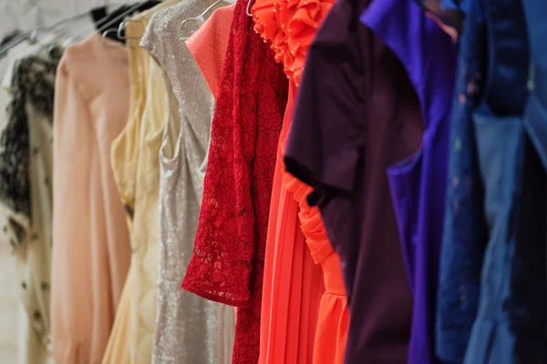 Colorful dresses on rack dress shop
