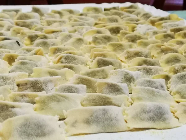 handmade ravioli in the home and placed in trays ready to be consumed