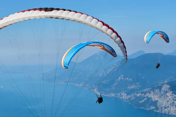 parachutists flying in sky, action sport 