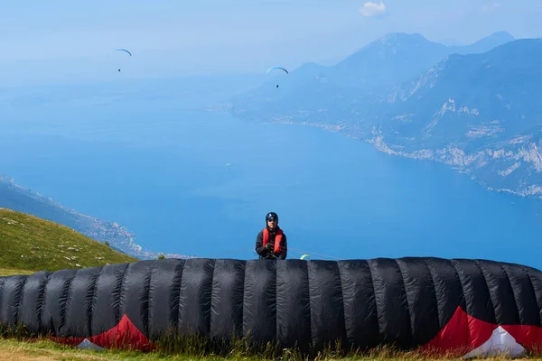 parachutist skydiver in mountains, action sport 