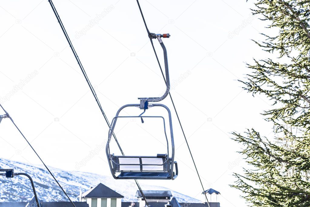Cable car going up on funicular in Sierra Nevada mountains