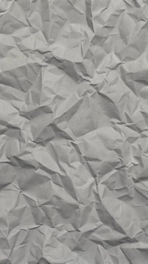 Gri kırışıklıklar ve gölgeli buruşuk kağıt dokusu, grunge markalaşması, kenar posterler ve alternatif tasarım projeleri için mükemmel..