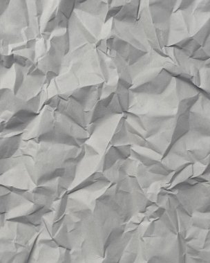 Gri kırışıklıklar ve gölgeli buruşuk kağıt dokusu, grunge markalaşması, kenar posterler ve alternatif tasarım projeleri için mükemmel..