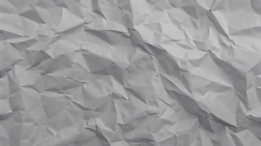 Gri kırışıklıklar ve gölgeli buruşuk kağıt dokusu, grunge markalaşması, kenar posterler ve alternatif tasarım projeleri için mükemmel..