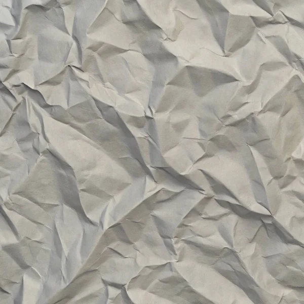 Gri kırışıklıklar ve gölgeli buruşuk kağıt dokusu, grunge markalaşması, kenar posterler ve alternatif tasarım projeleri için mükemmel..