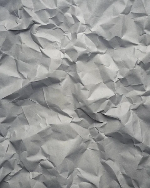 Gri kırışıklıklar ve gölgeli buruşuk kağıt dokusu, grunge markalaşması, kenar posterler ve alternatif tasarım projeleri için mükemmel..