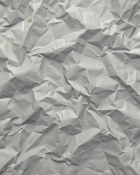 Gri kırışıklıklar ve gölgeli buruşuk kağıt dokusu, grunge markalaşması, kenar posterler ve alternatif tasarım projeleri için mükemmel..