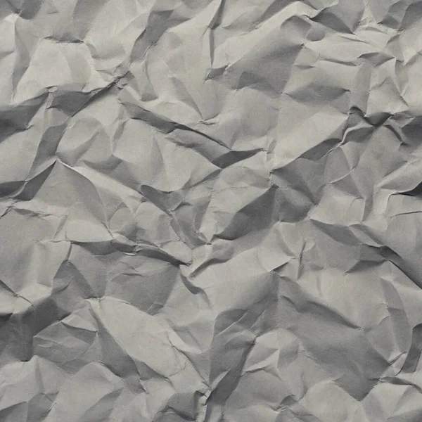 Gri kırışıklıklar ve gölgeli buruşuk kağıt dokusu, grunge markalaşması, kenar posterler ve alternatif tasarım projeleri için mükemmel..