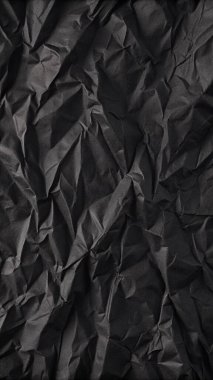 Buruşuk kağıt kırışıklıkları olan şık siyah doku, editör tasarımı için mükemmel, modern posterler, ve yaratıcı grafik projeleri.
