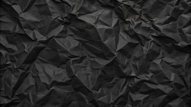 Buruşuk kağıt kırışıklıkları olan şık siyah doku, editör tasarımı için mükemmel, modern posterler, ve yaratıcı grafik projeleri.