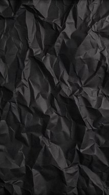 Buruşuk kağıt kırışıklıkları olan şık siyah doku, editör tasarımı için mükemmel, modern posterler, ve yaratıcı grafik projeleri.