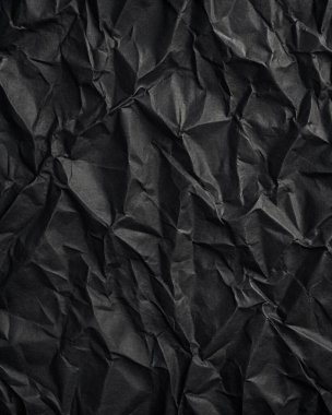 Buruşuk kağıt kırışıklıkları olan şık siyah doku, editör tasarımı için mükemmel, modern posterler, ve yaratıcı grafik projeleri.