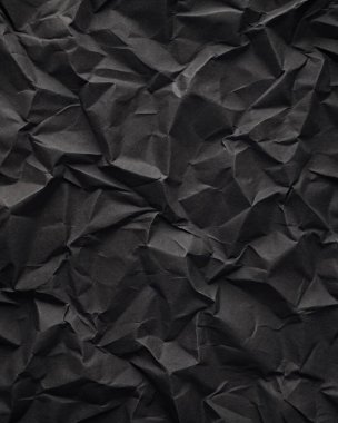 Buruşuk kağıt kırışıklıkları olan şık siyah doku, editör tasarımı için mükemmel, modern posterler, ve yaratıcı grafik projeleri.