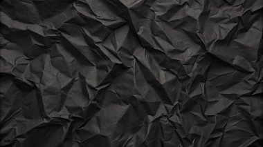 Buruşuk kağıt kırışıklıkları olan şık siyah doku, editör tasarımı için mükemmel, modern posterler, ve yaratıcı grafik projeleri.
