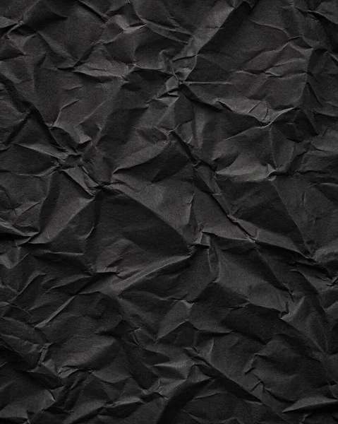 Buruşuk kağıt kırışıklıkları olan şık siyah doku, editör tasarımı için mükemmel, modern posterler, ve yaratıcı grafik projeleri.