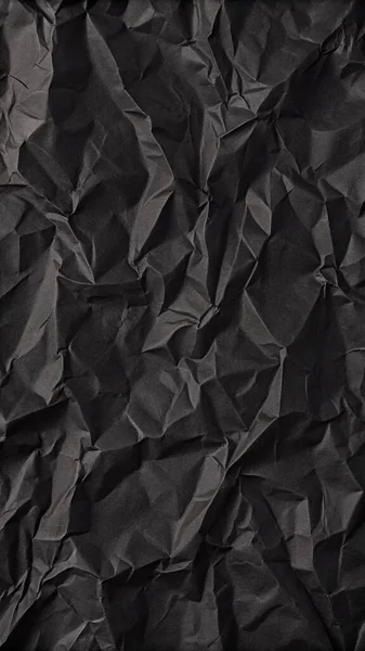 Buruşuk kağıt kırışıklıkları olan şık siyah doku, editör tasarımı için mükemmel, modern posterler, ve yaratıcı grafik projeleri.