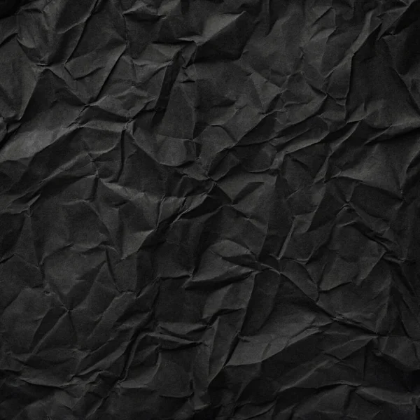 Buruşuk kağıt kırışıklıkları olan şık siyah doku, editör tasarımı için mükemmel, modern posterler, ve yaratıcı grafik projeleri.