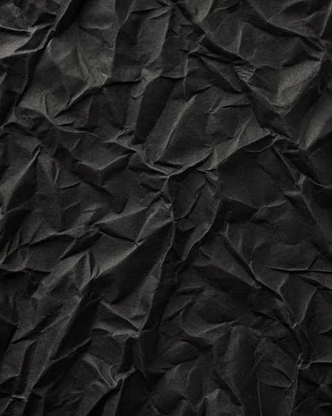 Buruşuk kağıt kırışıklıkları olan şık siyah doku, editör tasarımı için mükemmel, modern posterler, ve yaratıcı grafik projeleri.