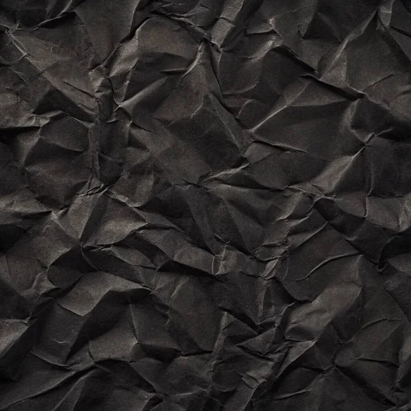 Buruşuk kağıt kırışıklıkları olan şık siyah doku, editör tasarımı için mükemmel, modern posterler, ve yaratıcı grafik projeleri.