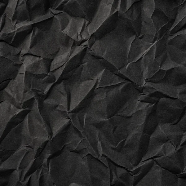 Buruşuk kağıt kırışıklıkları olan şık siyah doku, editör tasarımı için mükemmel, modern posterler, ve yaratıcı grafik projeleri.
