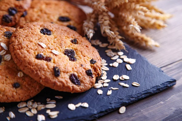 oatmeal cookies closeup on wooden background