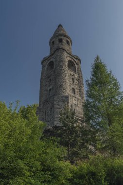 Observation tower Haj u Ase in spring sunny morning clipart