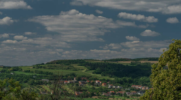 Vineyards and hills near Moravske Branice village in hot summer sunny color day