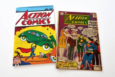 Los Angeles, California - September 21, 2025: Action Comics by DC Comics, first issue of June 1938 and #261 (February 1960) featuring the origin and first appearance of Streaky the Supercat