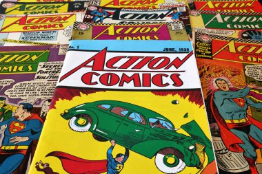 Los Angeles, California - September 21, 2025: Vintage covers of Action Comics by DC Comics, featuring Superman and Supergirl, among the first major American superhero characters